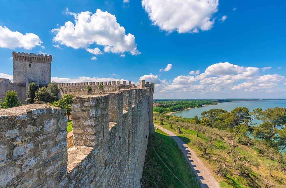guided tour amongst ruins of castle del Lago beside Trasimeno lake,
