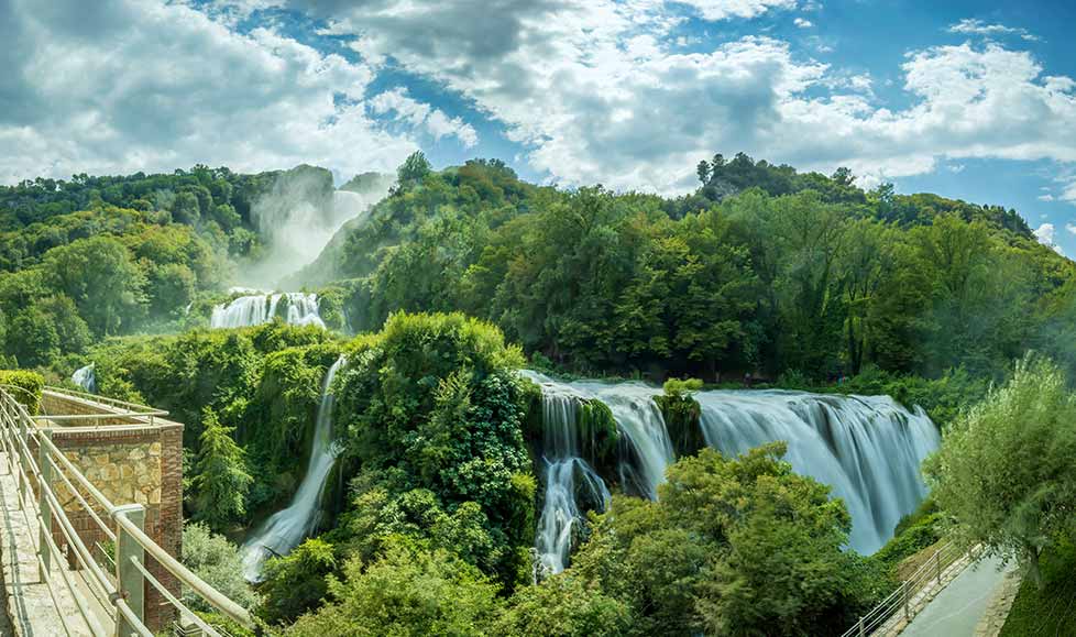 private tour group taking pictures at Marmore Waterfalls, Umbria