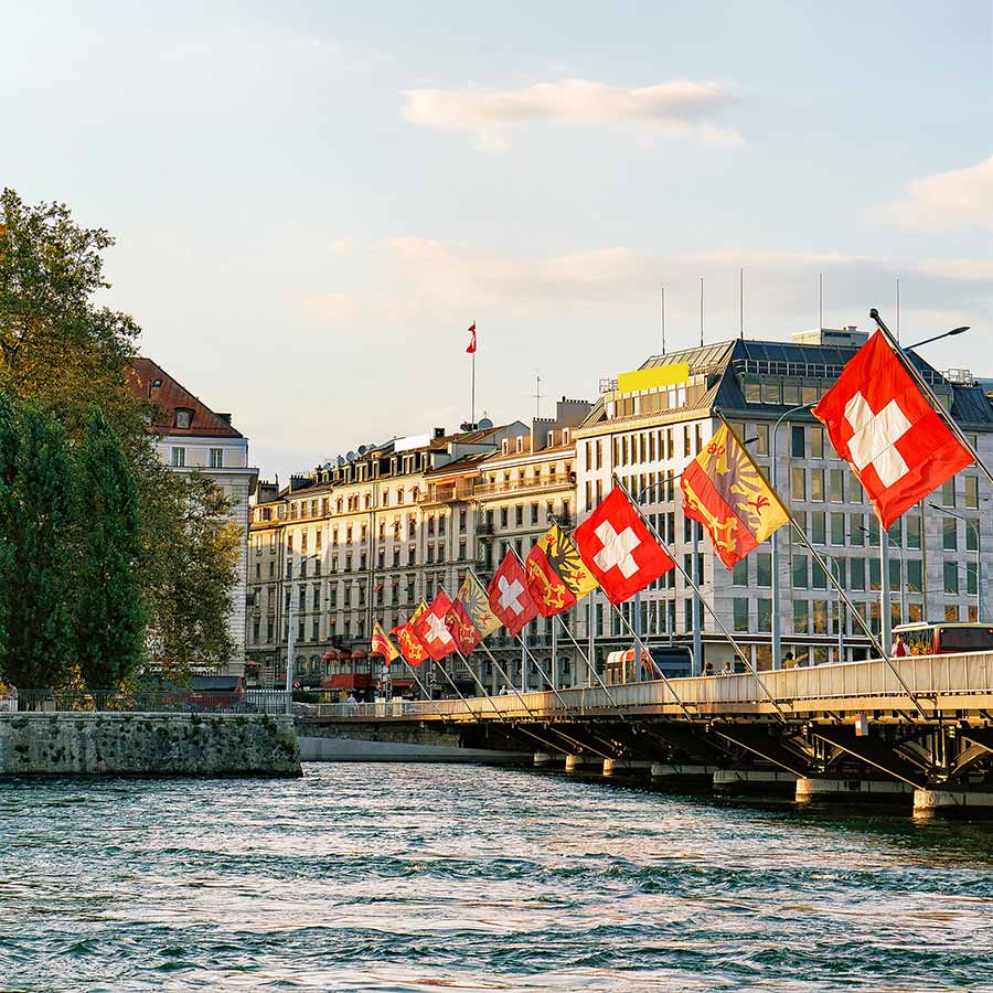 flags lining bridge in Geneva, Switzerland